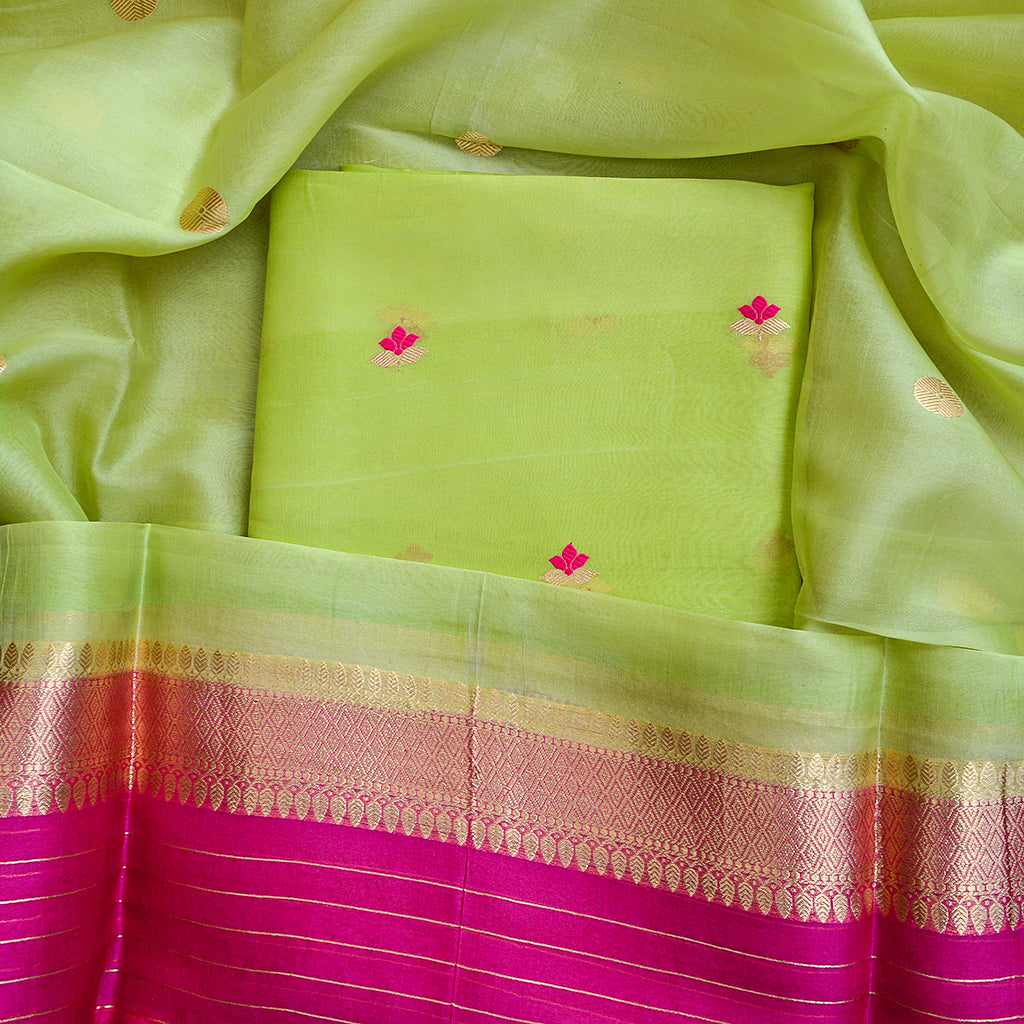 Green kora silk suit with pink shaded dupatta