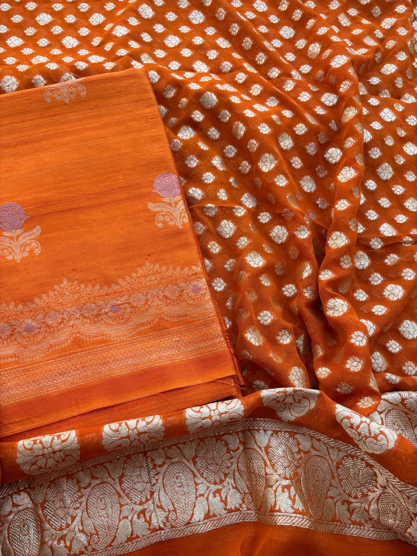 Rust raw silk kadhwa suit with Khaddi georgette dupatta
