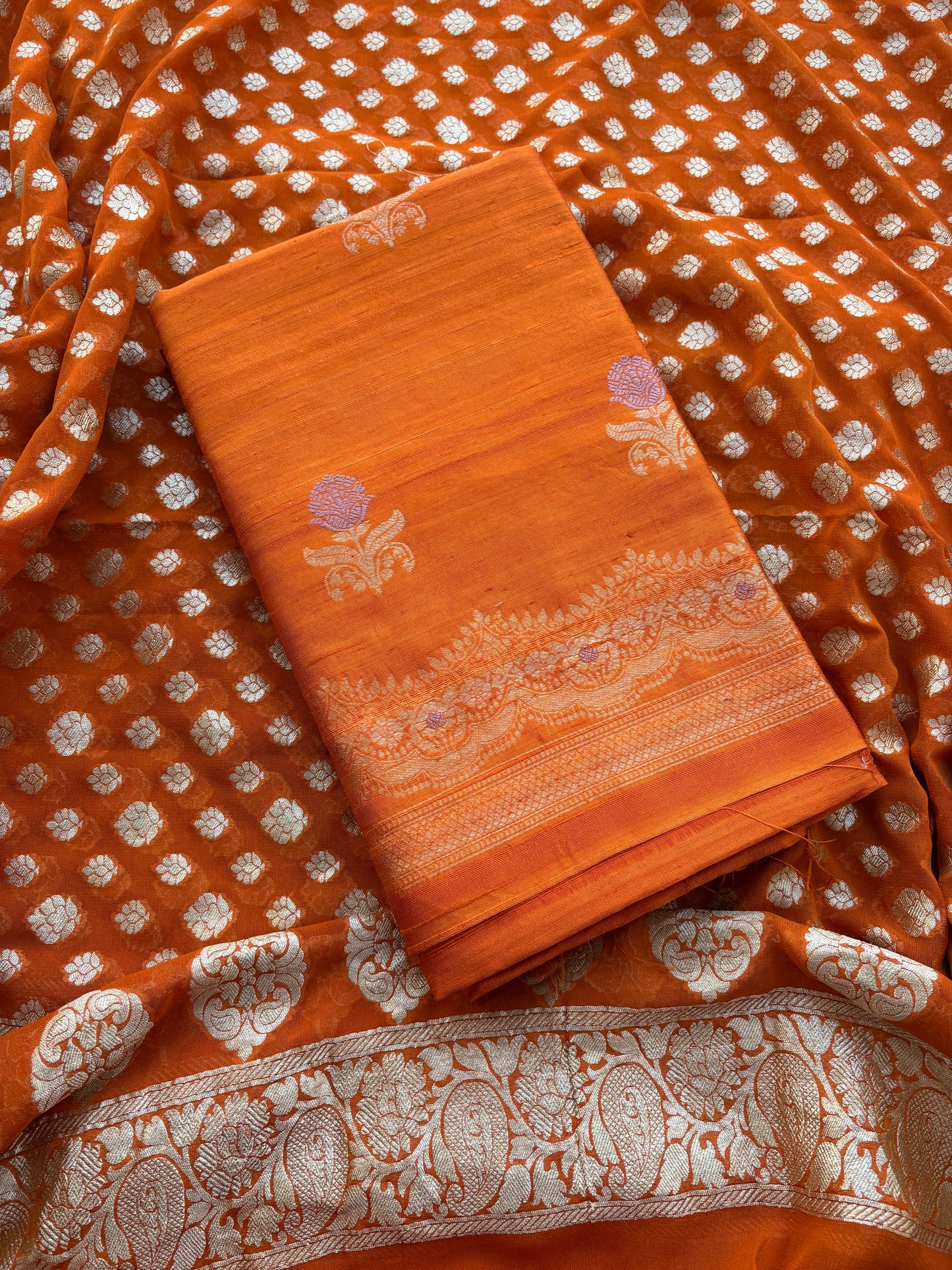 Rust raw silk kadhwa suit with Khaddi georgette dupatta