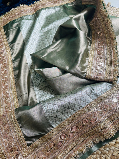 Green premium tissue saree with elaborated border