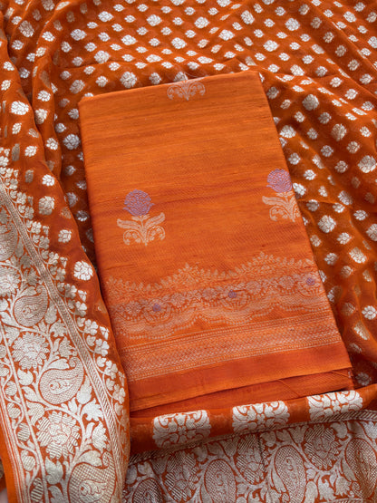 Rust raw silk kadhwa suit with Khaddi georgette dupatta