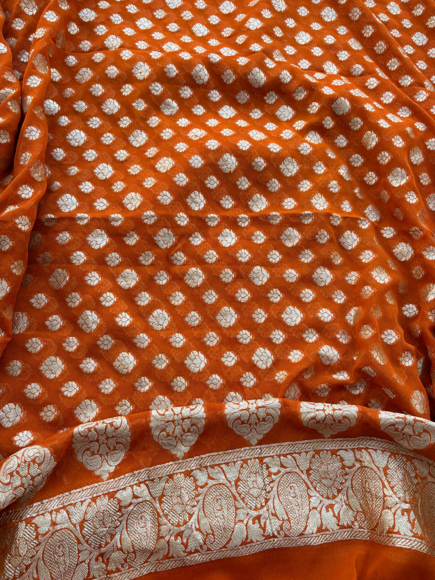 Rust raw silk kadhwa suit with Khaddi georgette dupatta