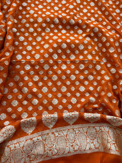 Rust raw silk kadhwa suit with Khaddi georgette dupatta