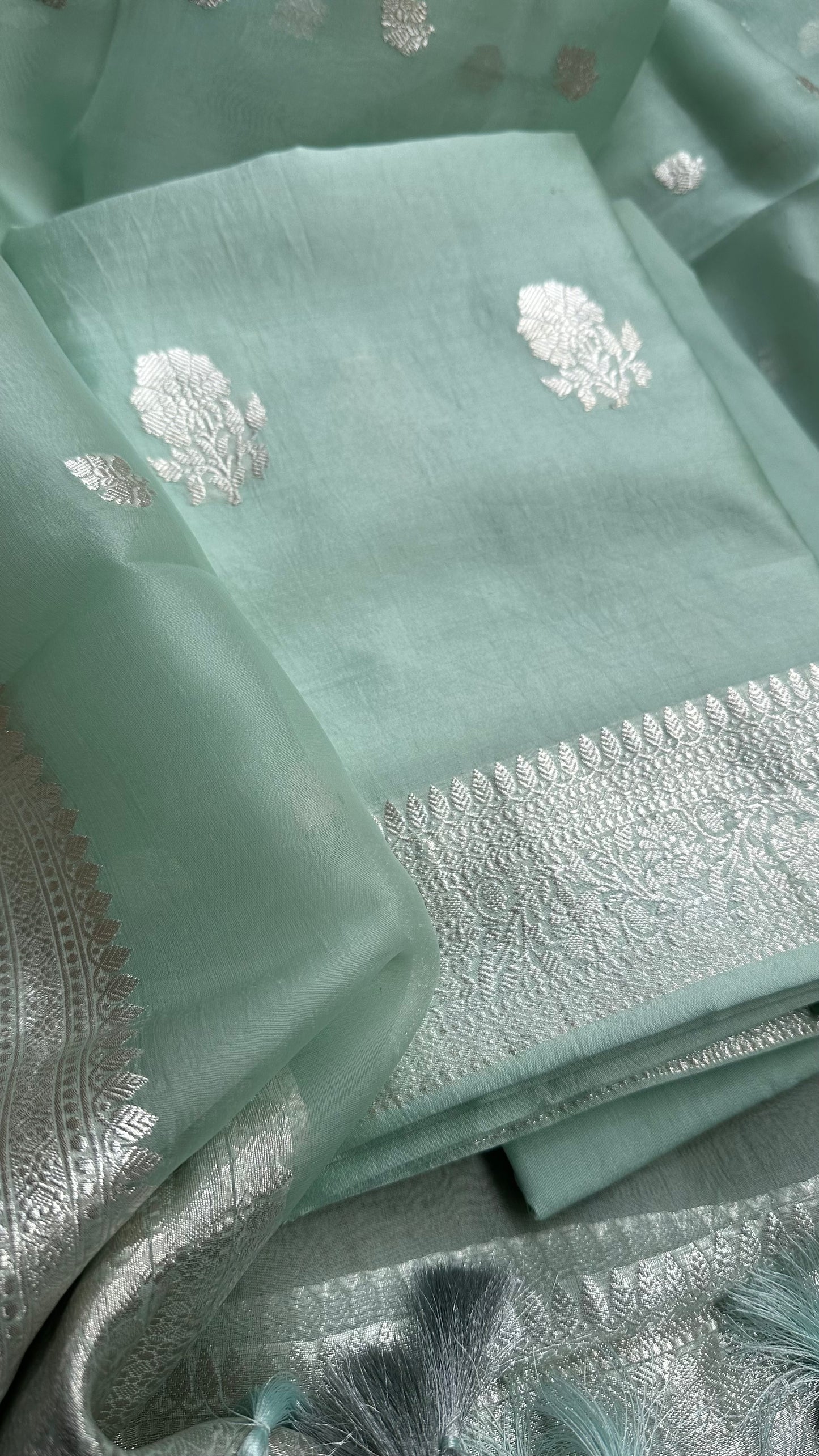 Pastel green pure silver chiniya silk suit, kora silk dupatta, plain silk bottom.