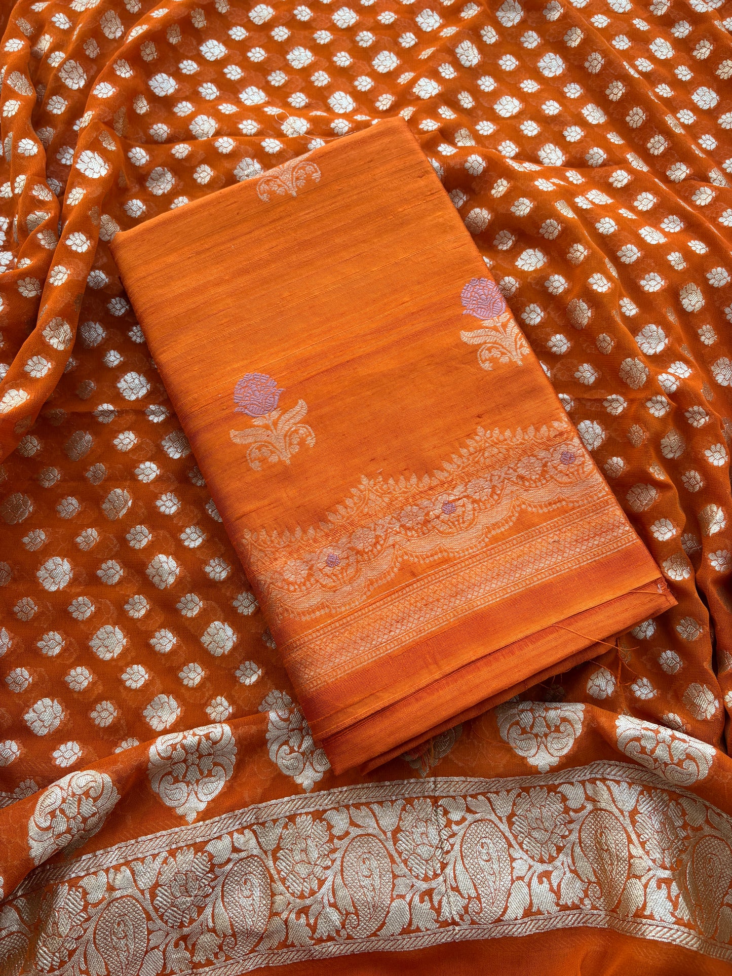 Rust raw silk kadhwa suit with Khaddi georgette dupatta