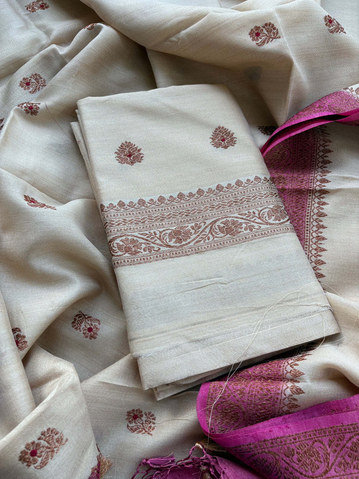 Cream tussar silk suit with pink shaded dupatta