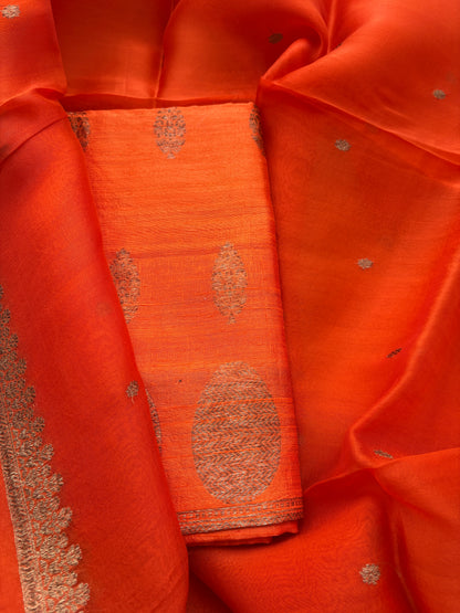 Orange raw silk suit set with Kora silk dupatta