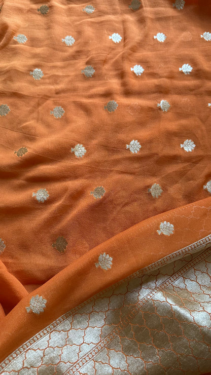 Orange kadhwa moonga silk kurta, moonga silk bottom and georgette dupatta.