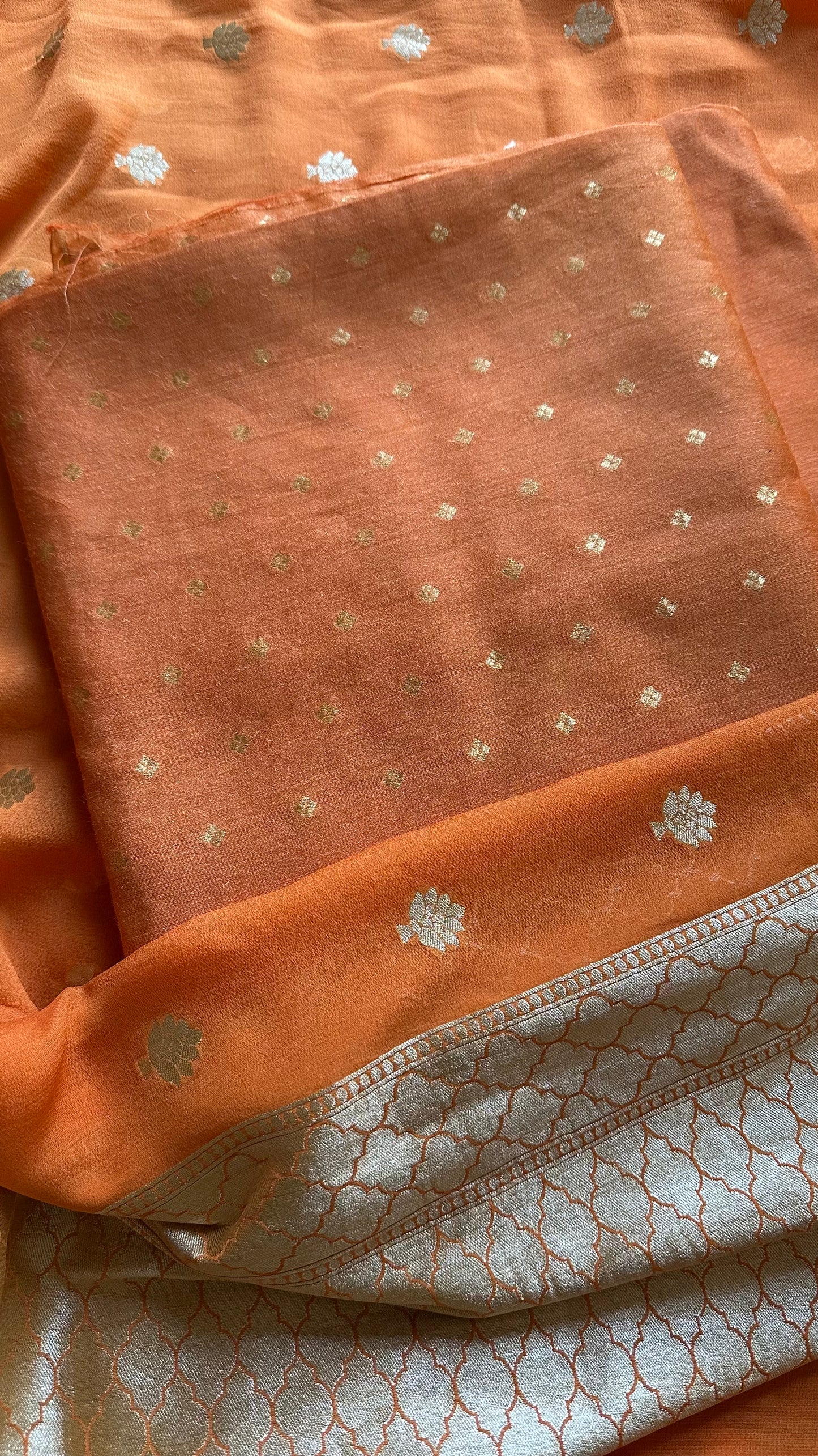 Orange kadhwa moonga silk kurta, moonga silk bottom and georgette dupatta.