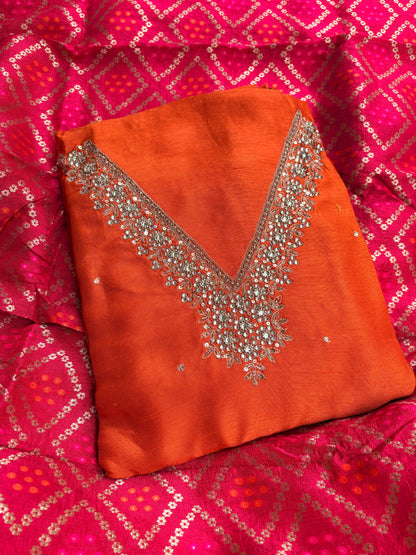 Orange hand embroidered kurta, red bandhani dupatta , plain bottom