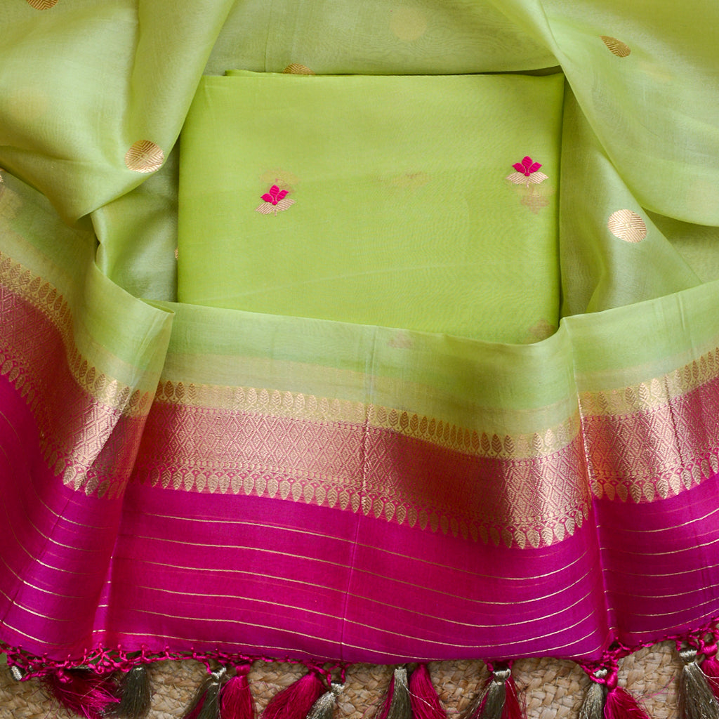 Green kora silk suit with pink shaded dupatta