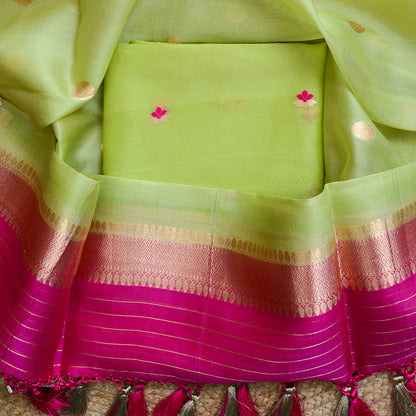 Green kora silk suit with pink shaded dupatta