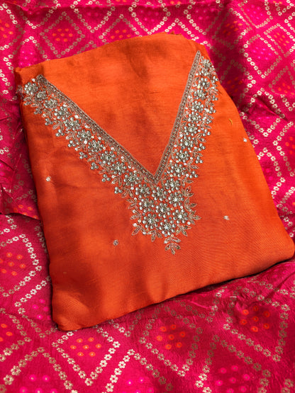 Orange hand embroidered kurta, red bandhani dupatta , plain bottom