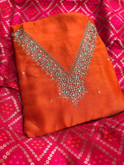 Orange hand embroidered kurta, red bandhani dupatta , plain bottom