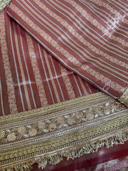 Premium tissue full Jaal saree with heavy border.