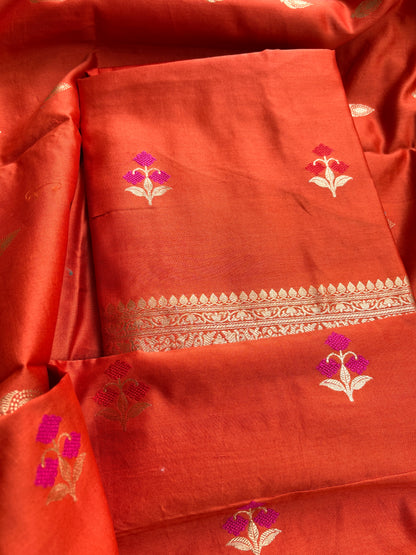Rust orange Chiniya silk kadhwa suit set.