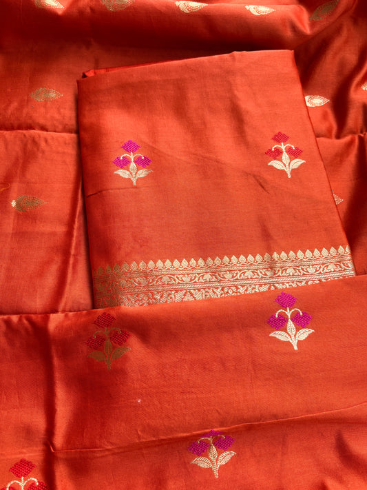 Rust orange Chiniya silk kadhwa suit set.