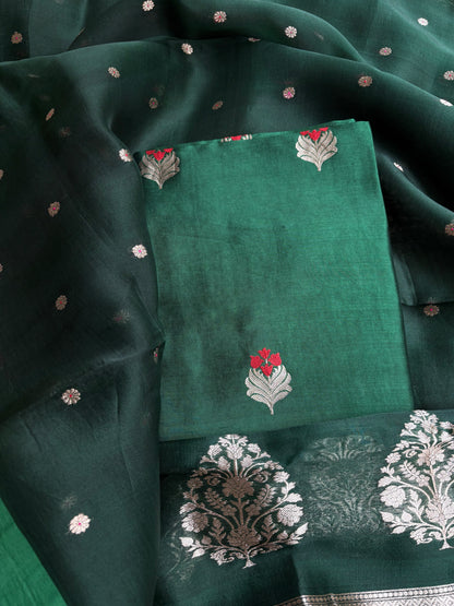 Bottle green chiniya silk kurta, kora silk dupatta, plain bottom.