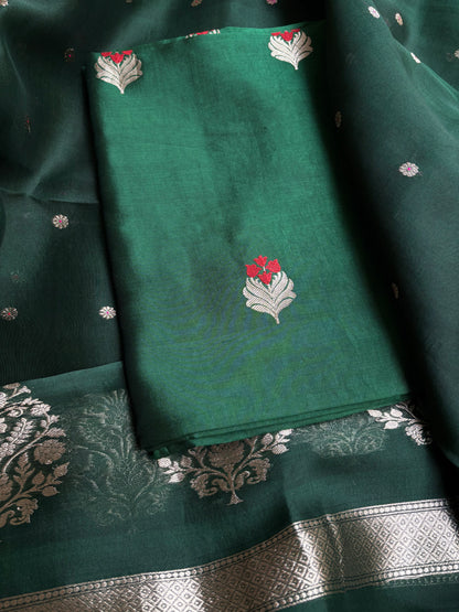 Bottle green chiniya silk kurta, kora silk dupatta, plain bottom.