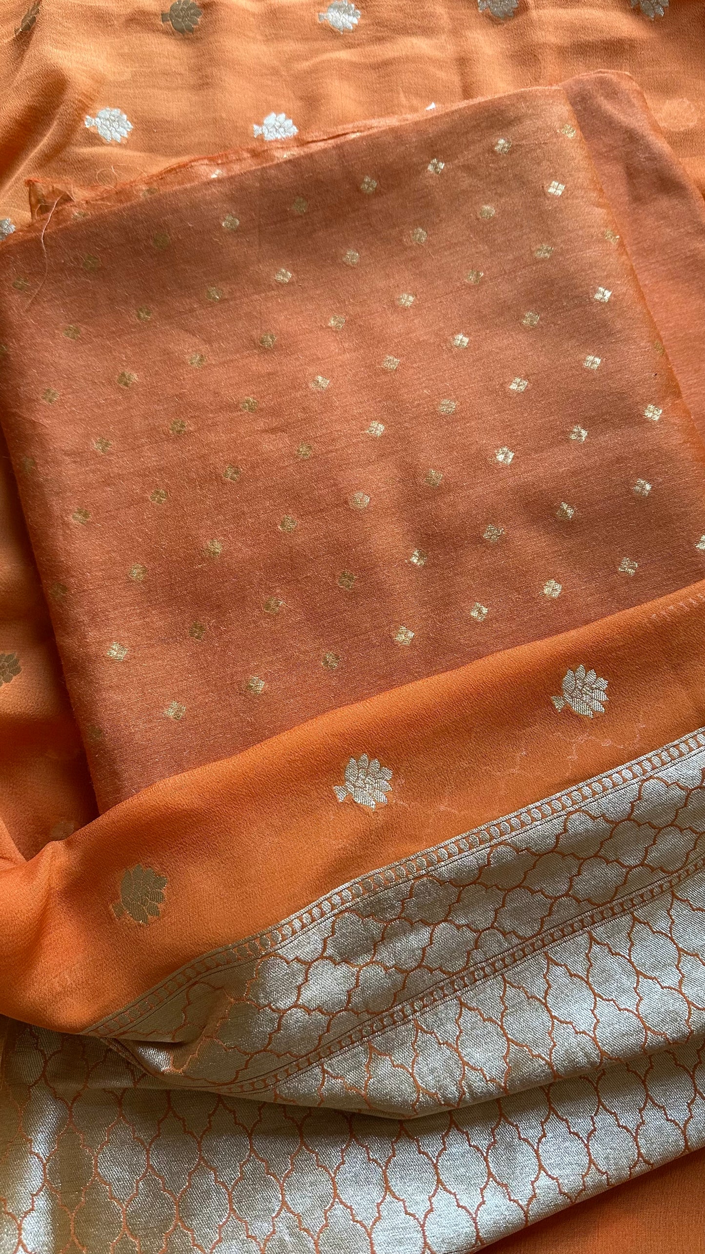 Orange kadhwa moonga silk kurta, moonga silk bottom and georgette dupatta.