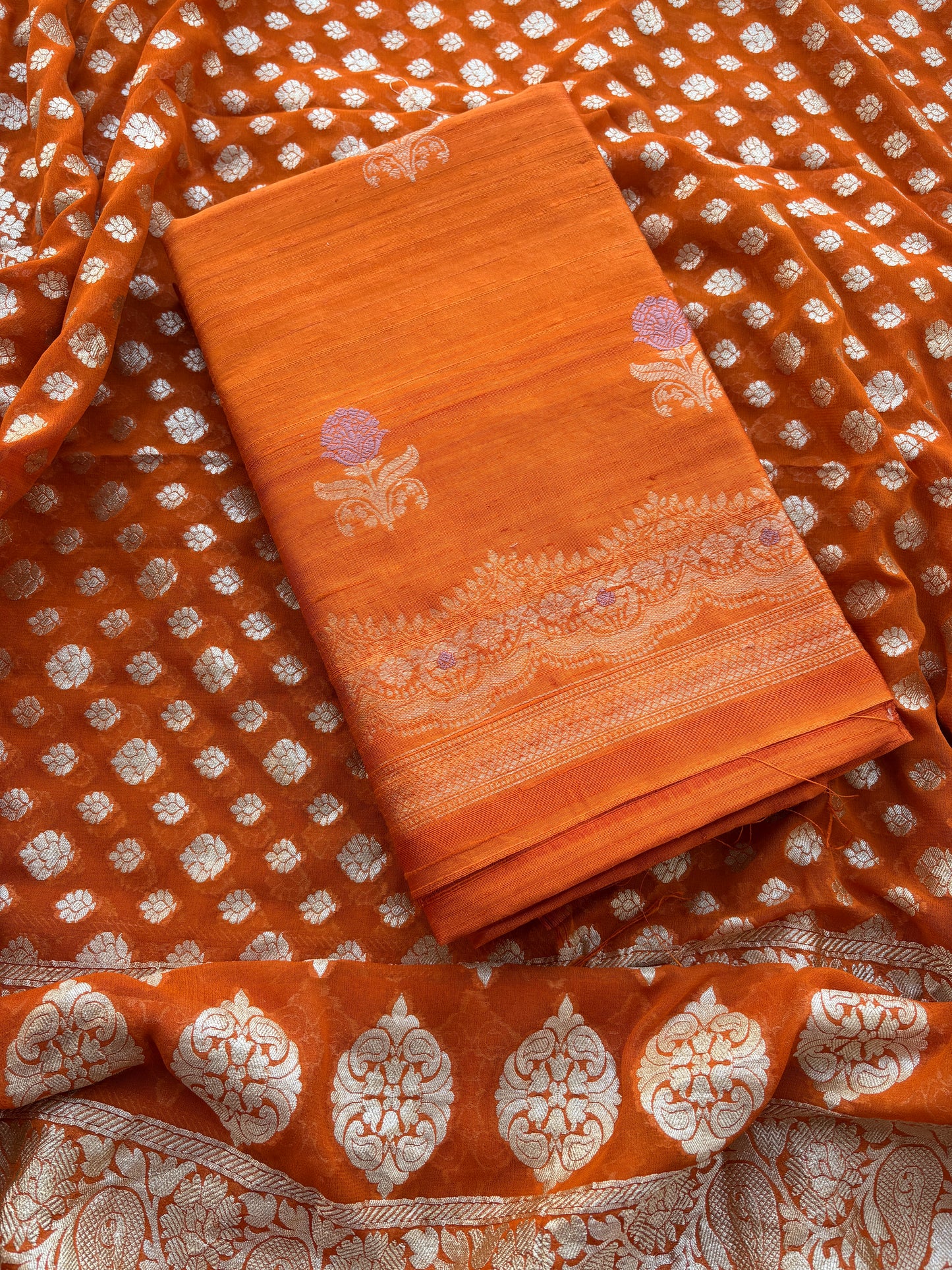Rust raw silk kadhwa suit with Khaddi georgette dupatta
