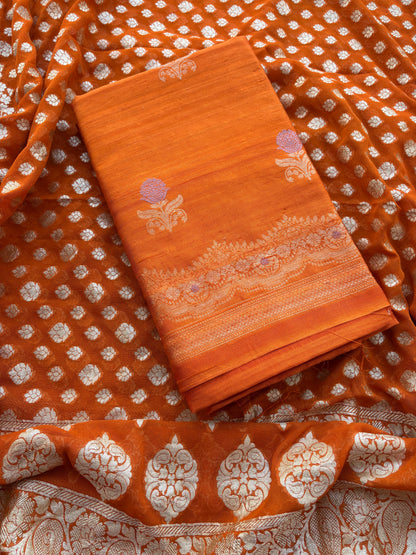 Rust raw silk kadhwa suit with Khaddi georgette dupatta