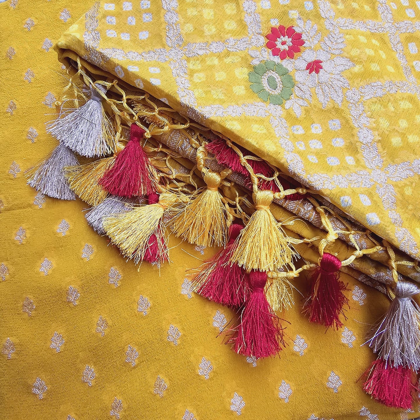 Yellow georgette Kurta with bandhani dupatta.