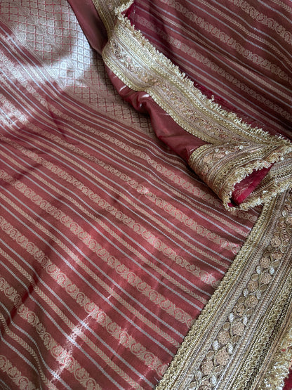 Premium tissue full Jaal saree with heavy border.