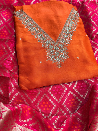 Orange hand embroidered kurta, red bandhani dupatta , plain bottom