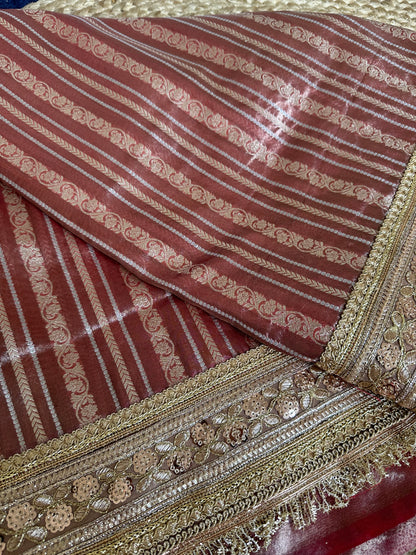 Premium tissue full Jaal saree with heavy border.