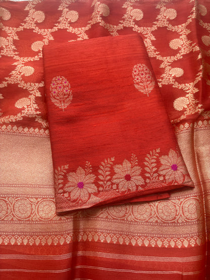 Orange raw silk suit with kadhwa jaal dupatta