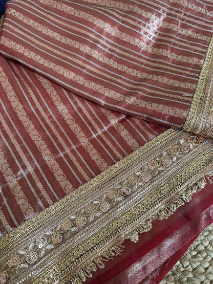 Premium tissue full Jaal saree with heavy border.