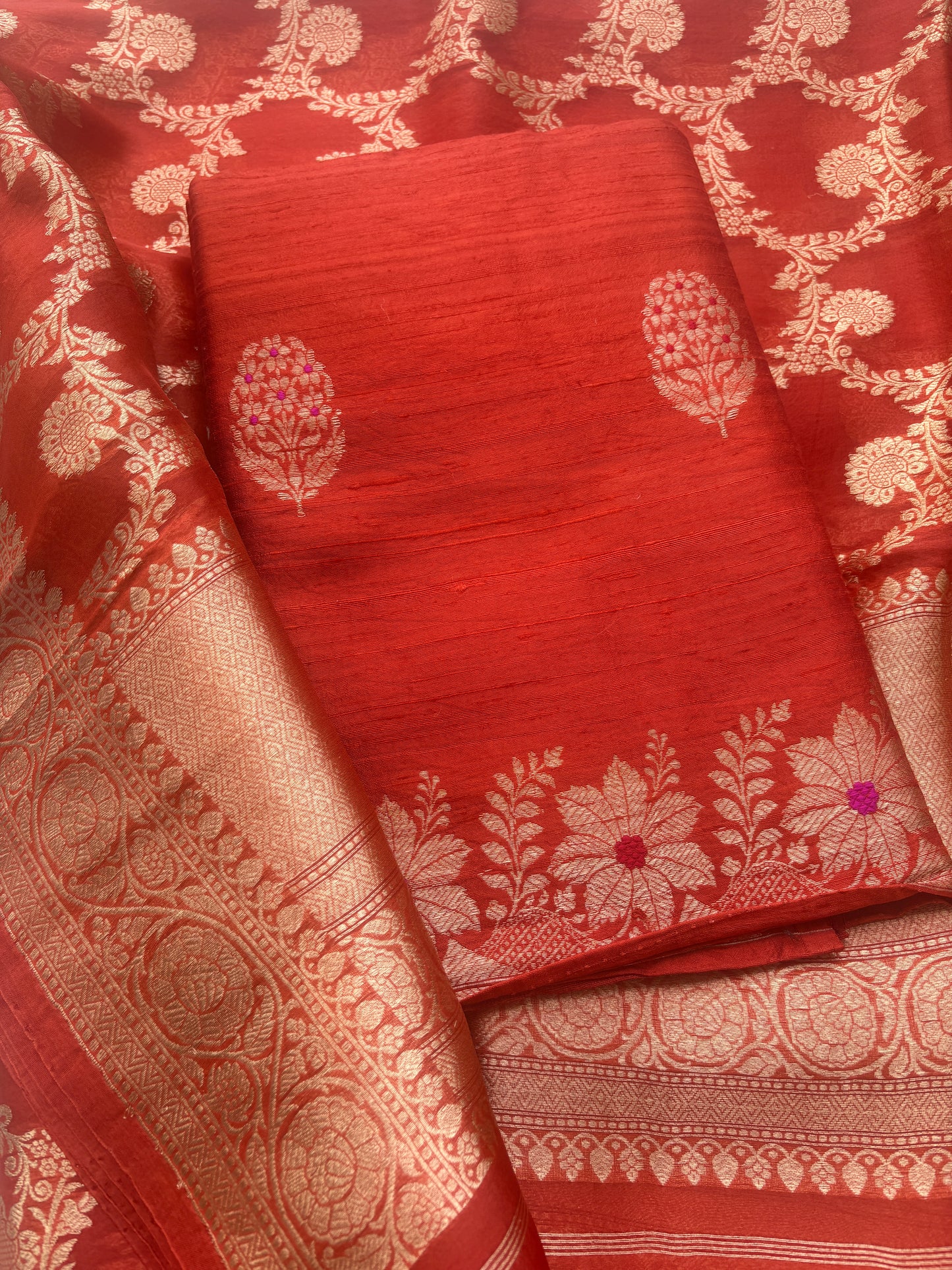 Orange raw silk suit with kadhwa jaal dupatta