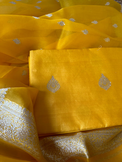 Yellow silver zari chiniya kurta, kora silk dupatta and plain bottom