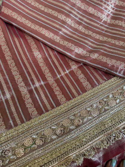 Premium tissue full Jaal saree with heavy border.