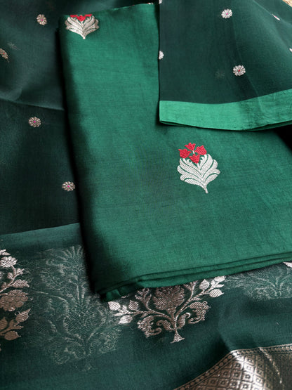 Bottle green chiniya silk kurta, kora silk dupatta, plain bottom.