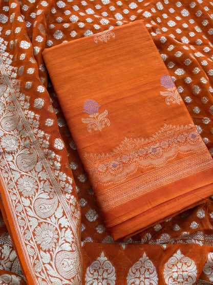 Rust raw silk kadhwa suit with Khaddi georgette dupatta
