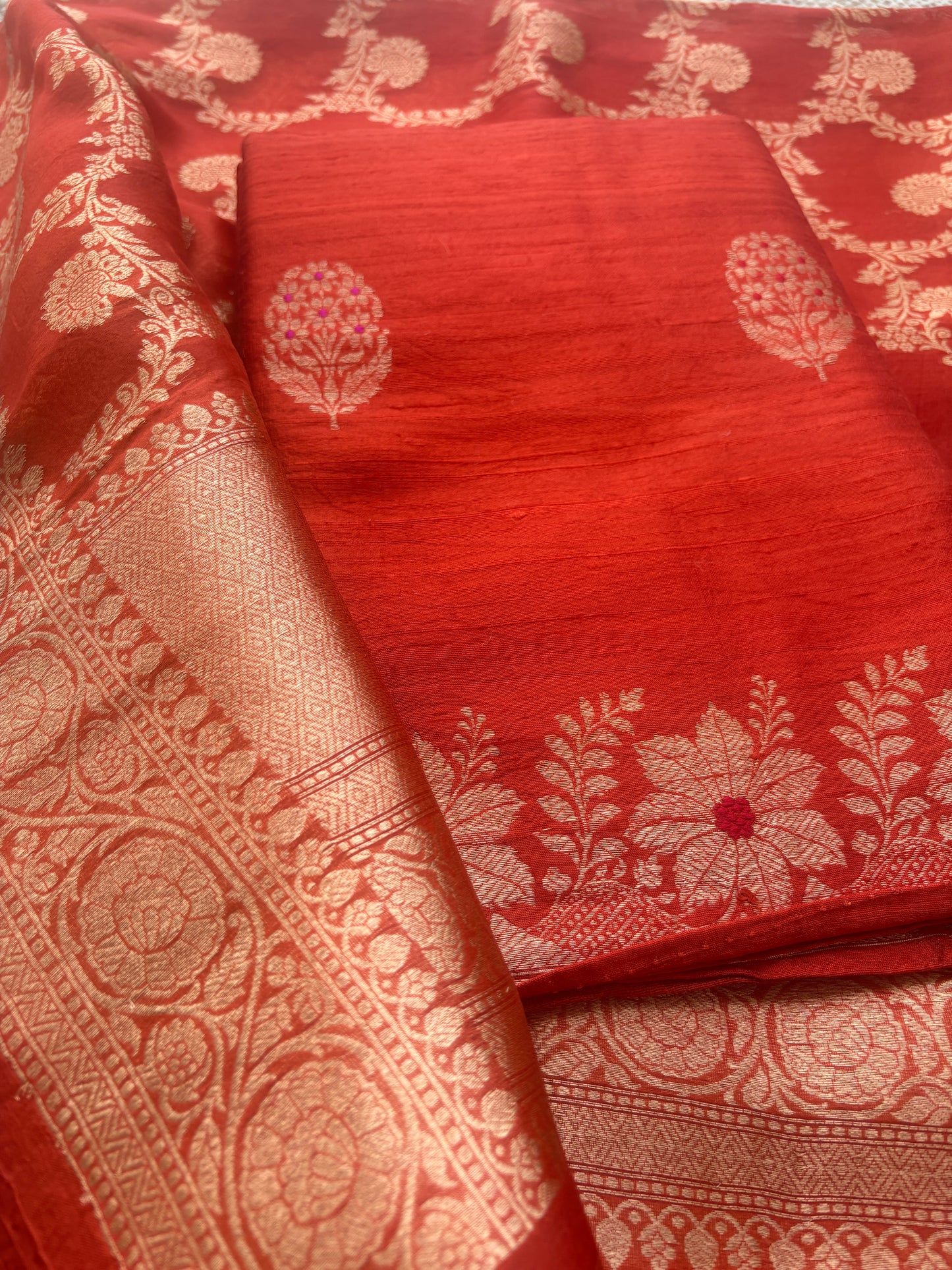 Orange raw silk suit with kadhwa jaal dupatta