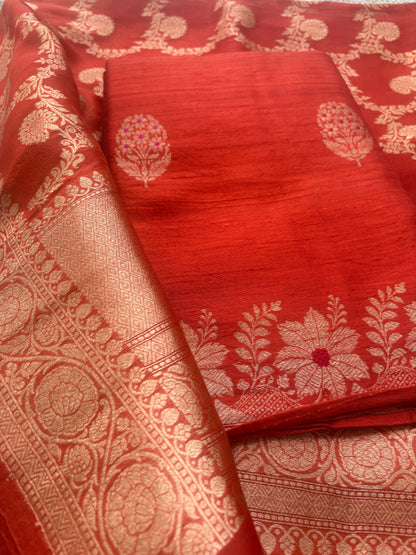 Orange raw silk suit with kadhwa jaal dupatta