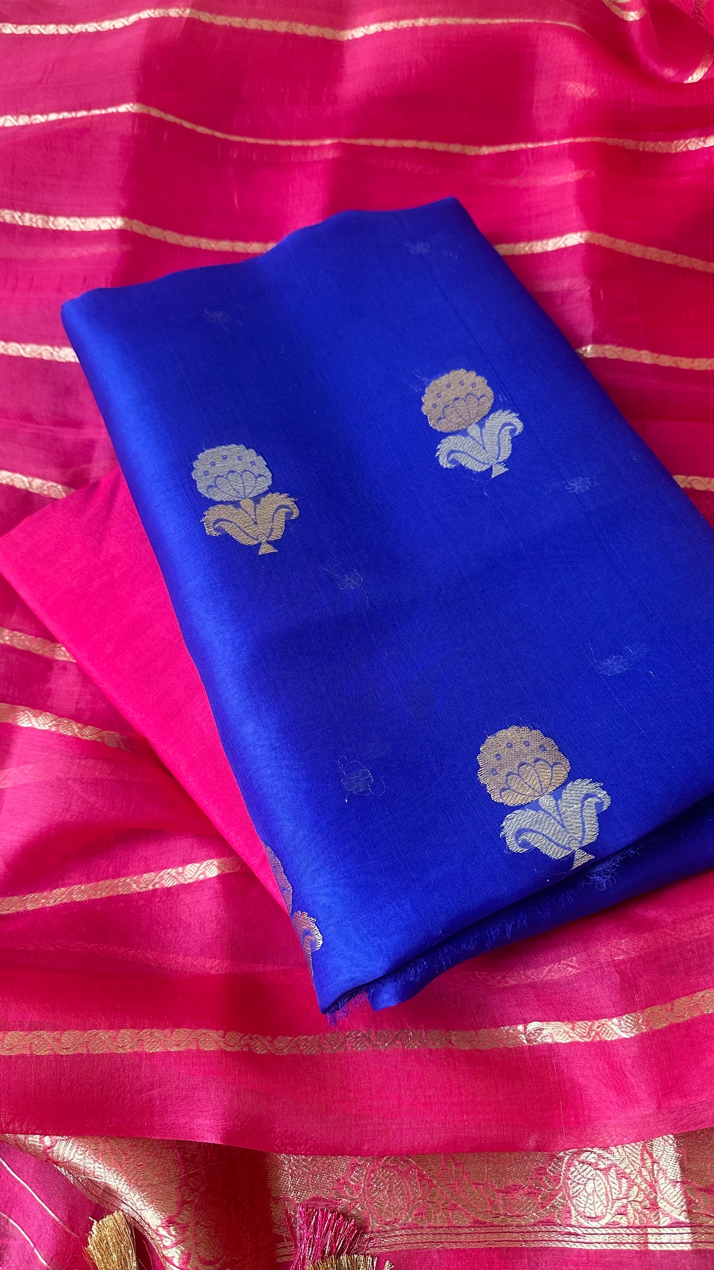 Blue kora shirt, pink kora dupatta and plain bottom.