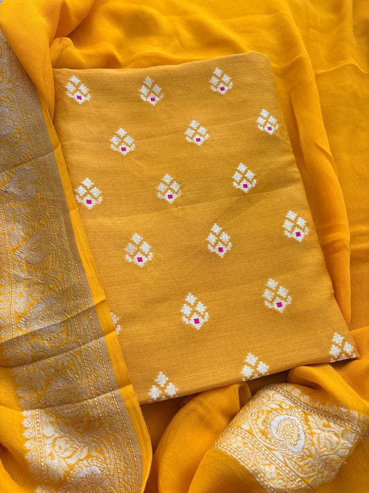 Yellow moonga silk suit with  Khaddi chiffon dupatta
