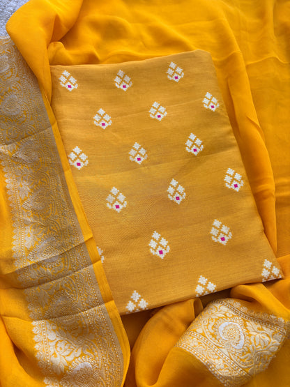 Yellow moonga silk suit with  Khaddi chiffon dupatta