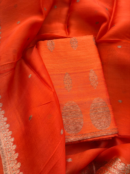 Orange raw silk suit set with Kora silk dupatta