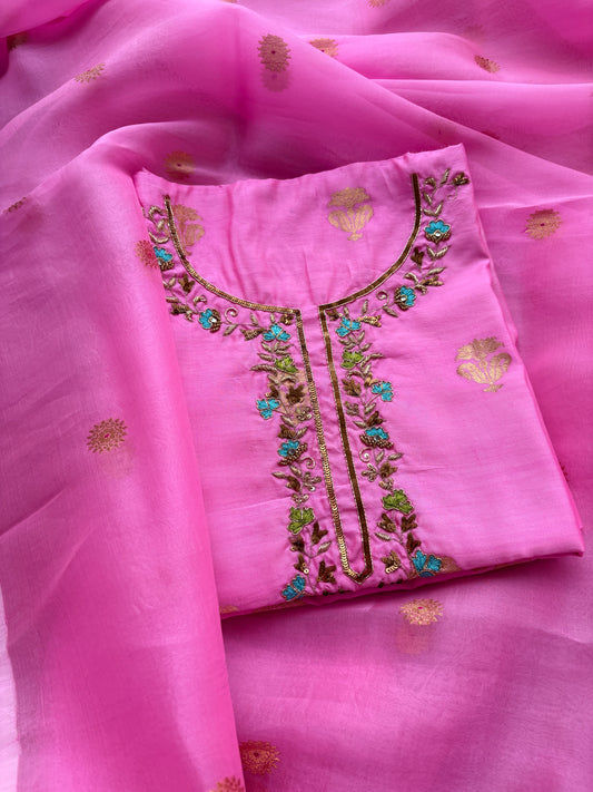 Pink Chiniya silk with hand embroidered neck design .