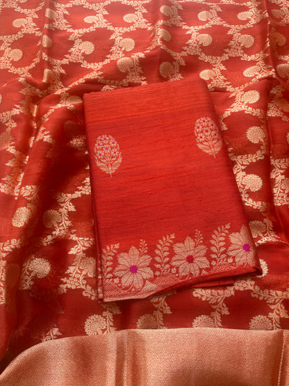 Orange raw silk suit with kadhwa jaal dupatta