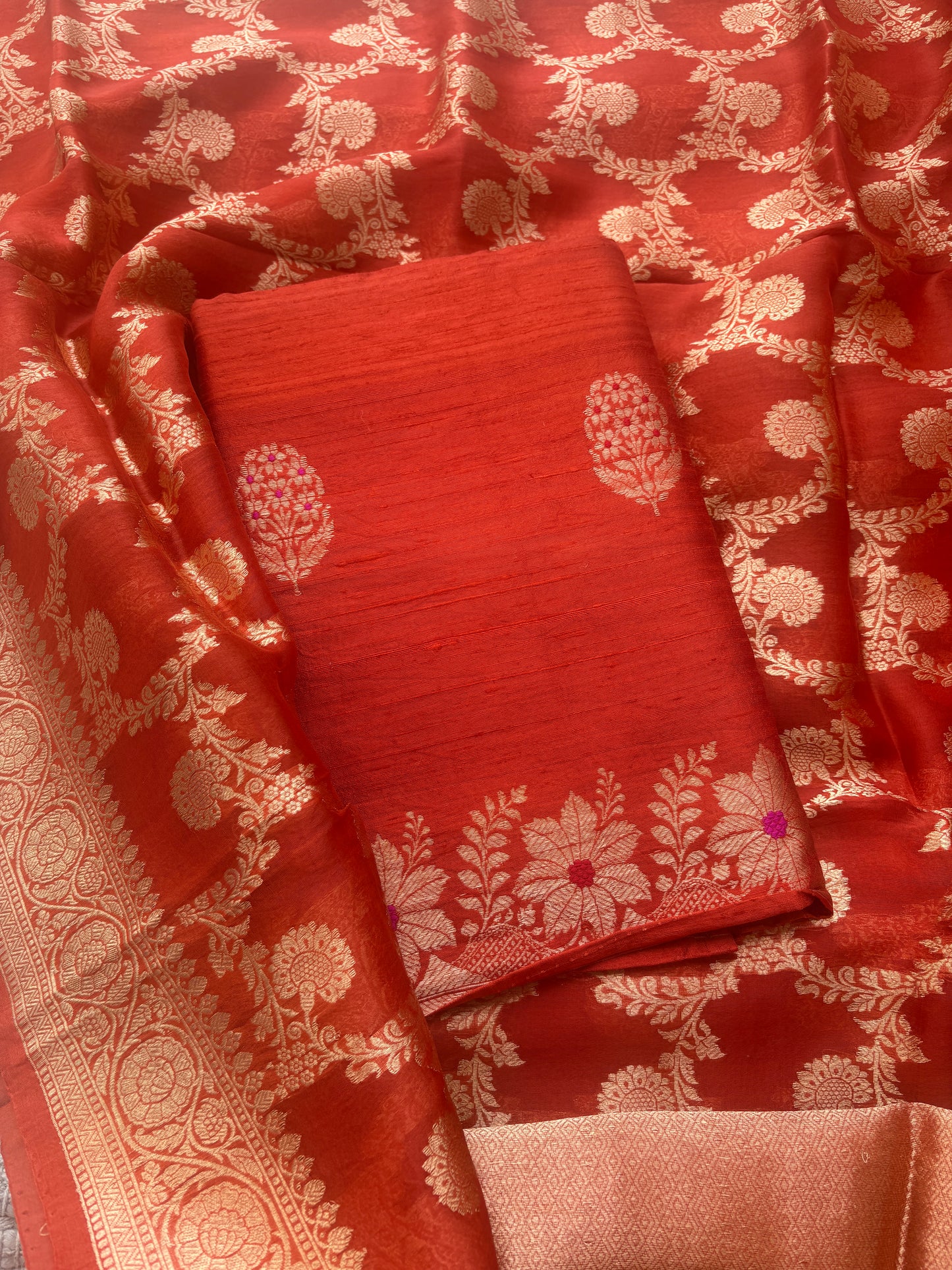 Orange raw silk suit with kadhwa jaal dupatta