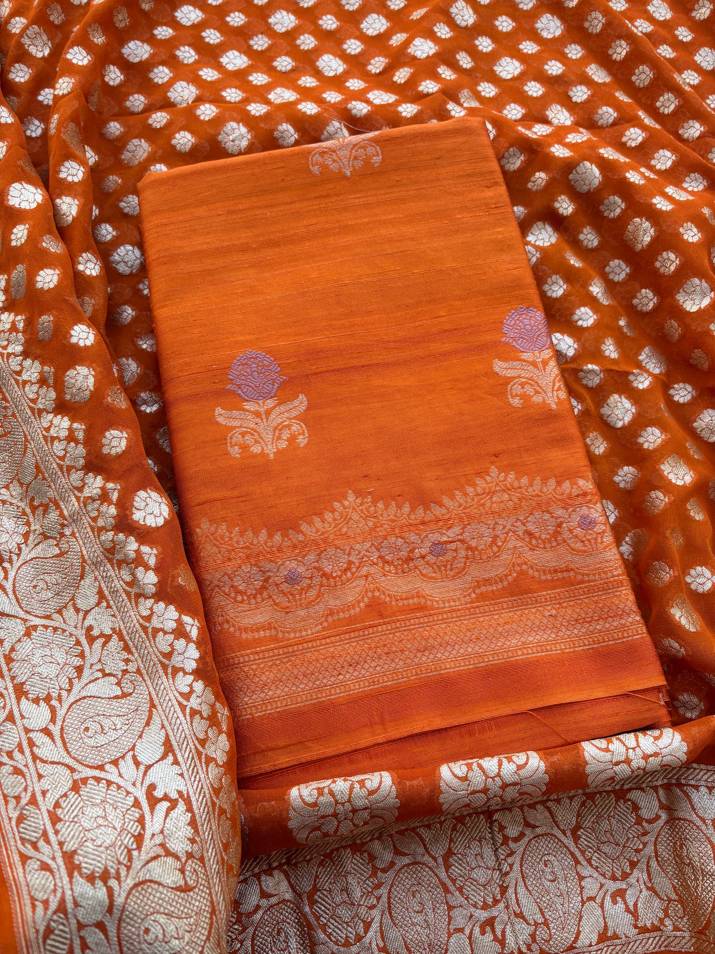 Rust raw silk kadhwa suit with Khaddi georgette dupatta