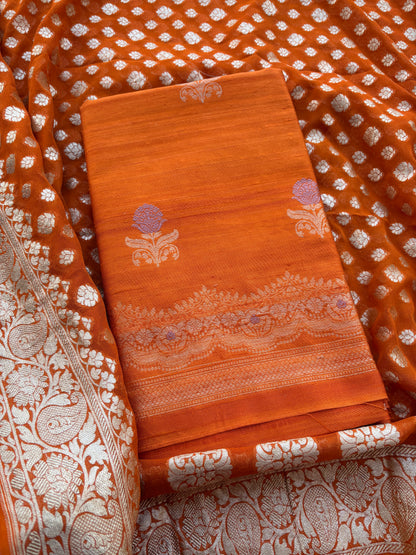 Rust raw silk kadhwa suit with Khaddi georgette dupatta