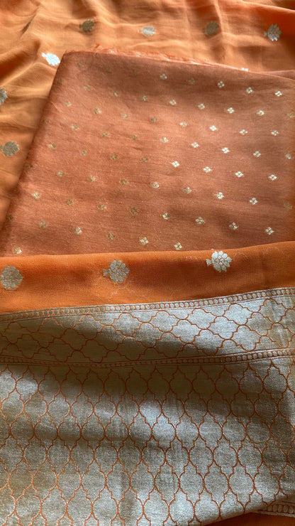 Orange kadhwa moonga silk kurta, moonga silk bottom and georgette dupatta.