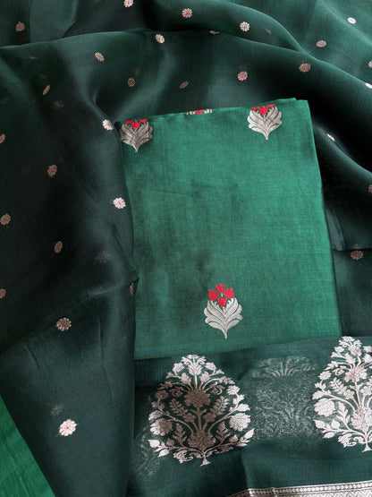 Bottle green chiniya silk kurta, kora silk dupatta, plain bottom.